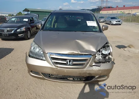 2007 Honda Odyssey Ex-L z USA, uszkodzony, nr VIN 5FNRL387X7B137895